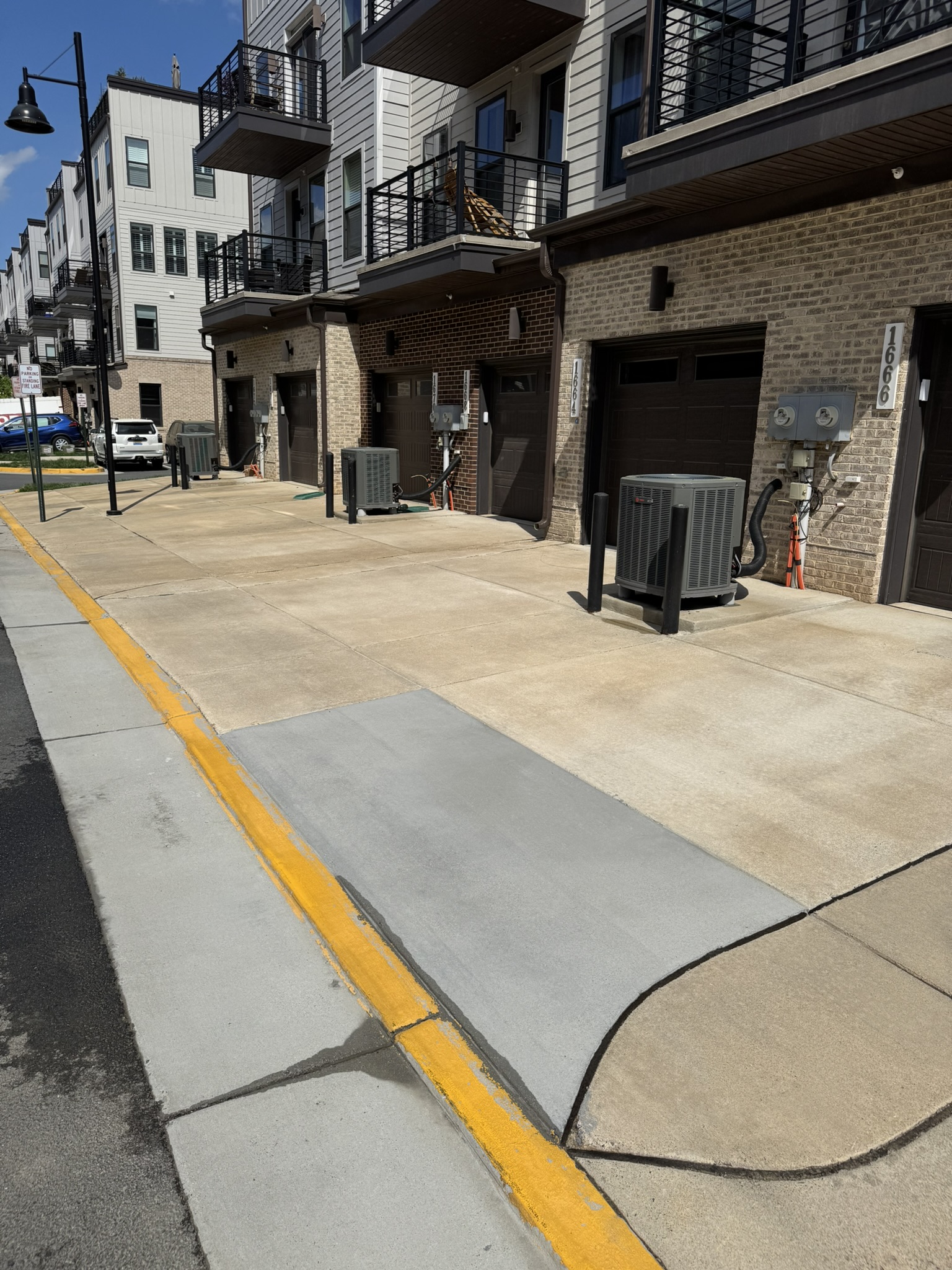 Bright clean driveway after pressure washing